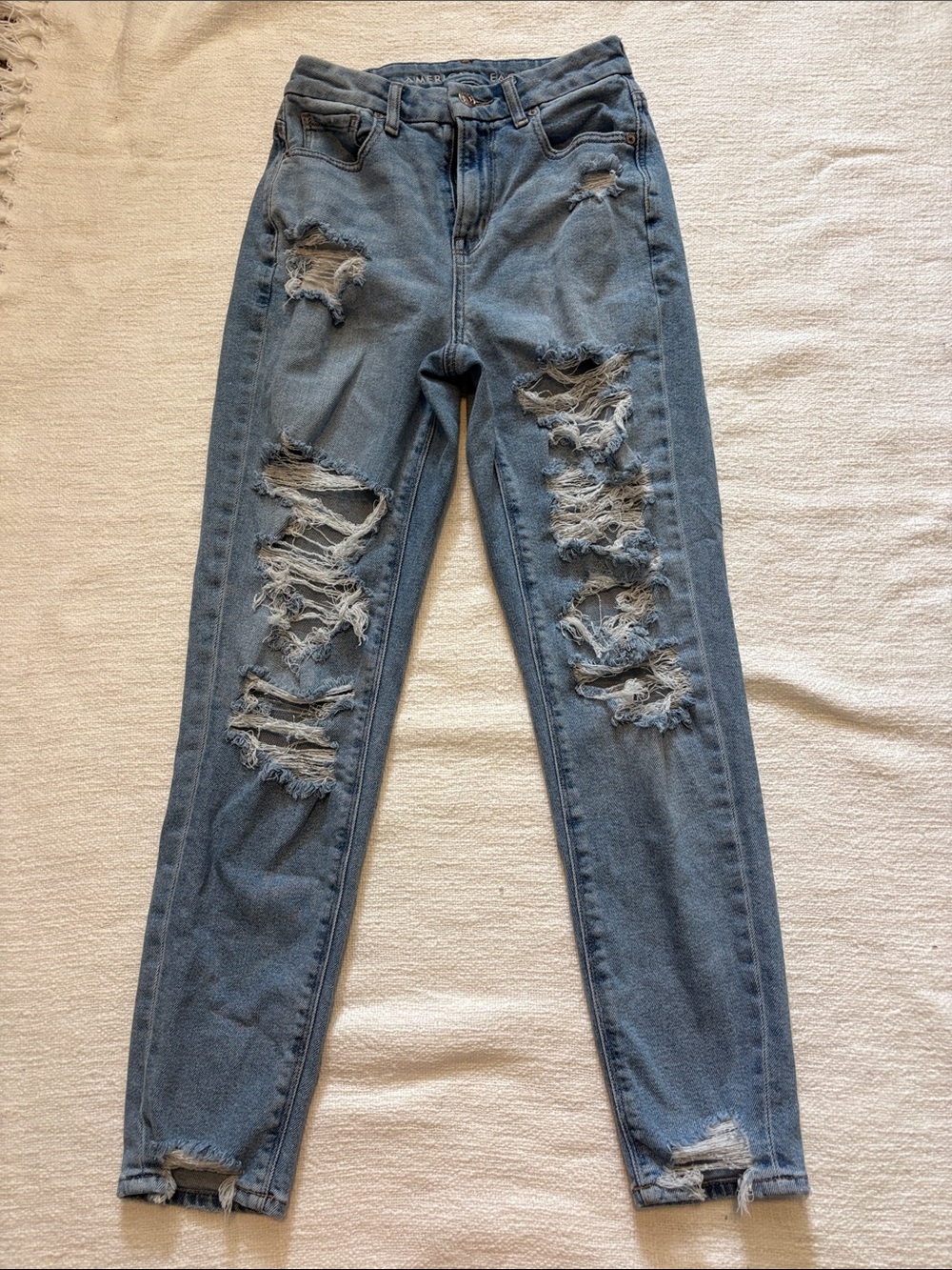 American Eagle Outfitters Light Blue High-Rise Distressed Jeans